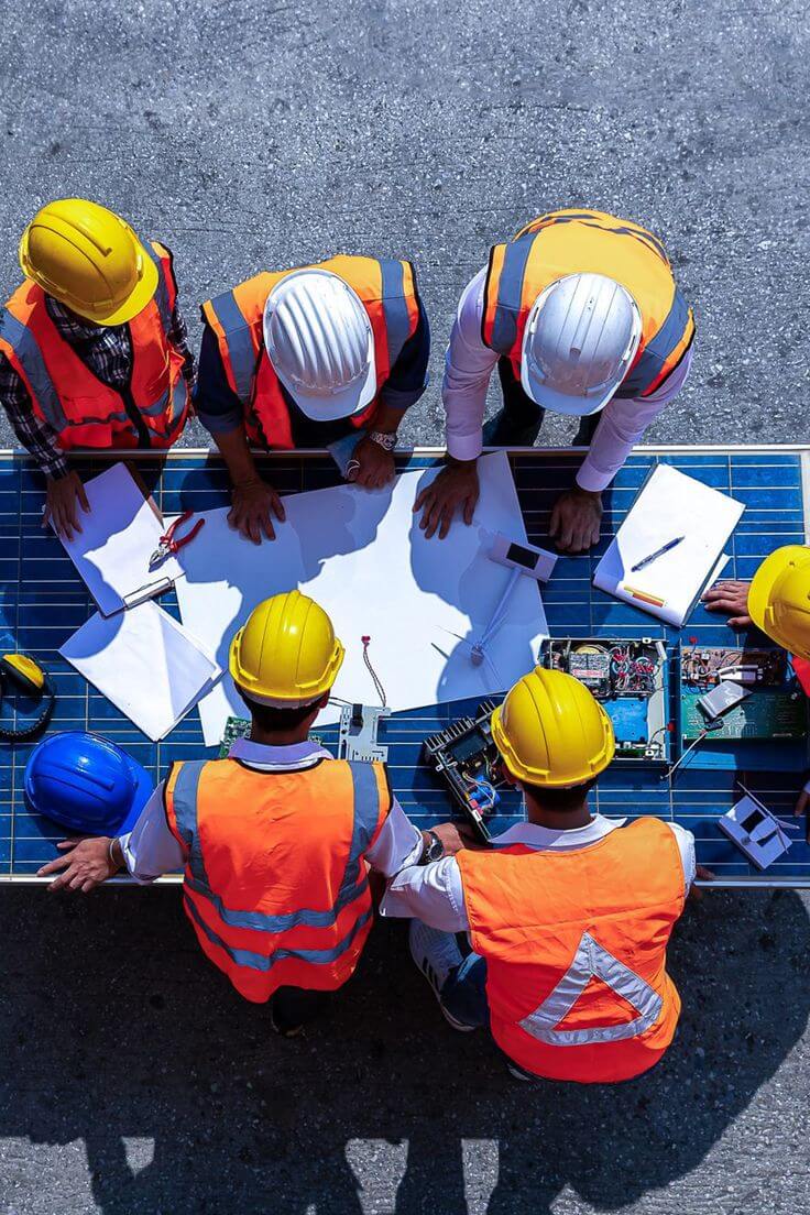 Engineering professionals working together